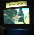 A kiosk with Wii Sports: Airplane playable shown at E3 2006