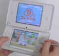 A DSi with Kuruma de DS being played on it.